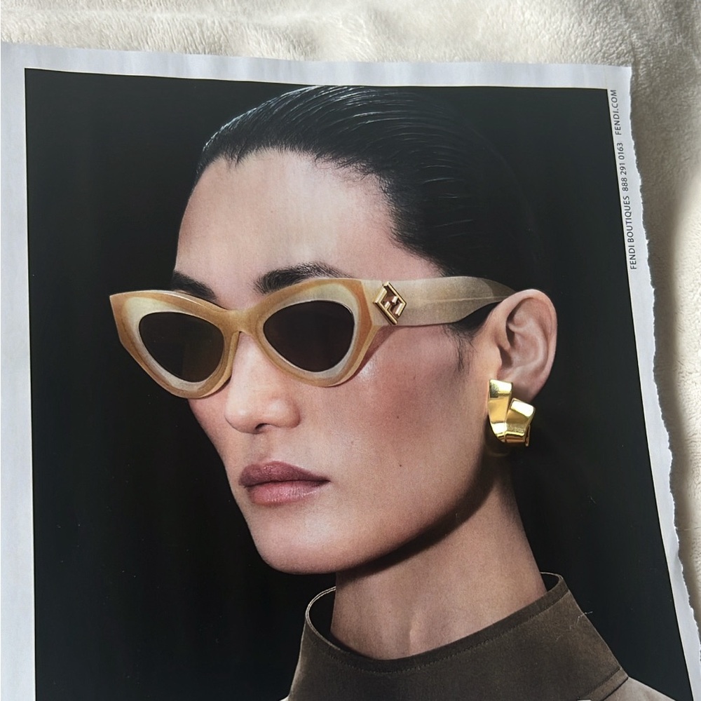 Vintage 1970’-1980’s Trifari gold ribbon cuff earrings